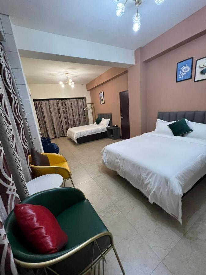 Haoyue Hotel Жинченг Екстериор снимка