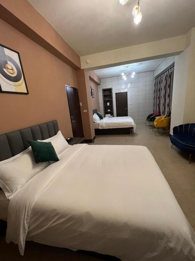 Haoyue Hotel Жинченг Екстериор снимка